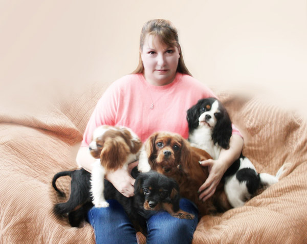 Image of Krystal with puppies